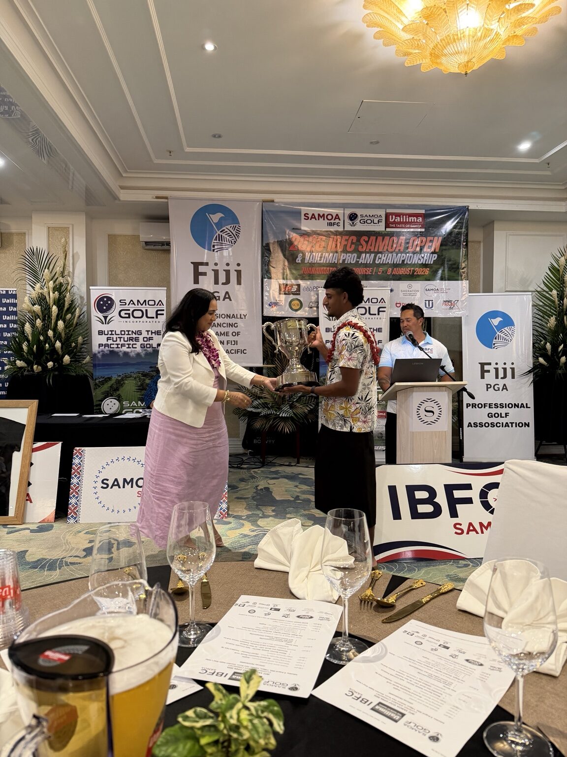 A guest receiving recognition during the Samoa Open closing programme